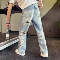 Men's Heavily Distressed Wide Leg Jeans | Low Rise Hip Hop Flare Denim with Big Rips